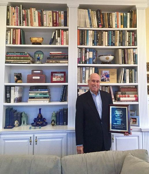 This image has an empty alt attribute; its file name is stuart-il-award.book-case.jpg